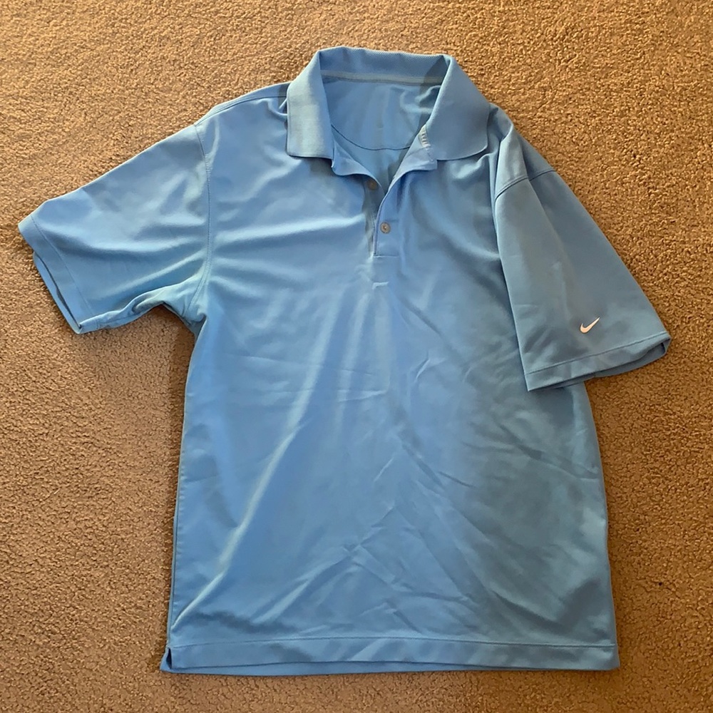 Blue Nike golf shirt